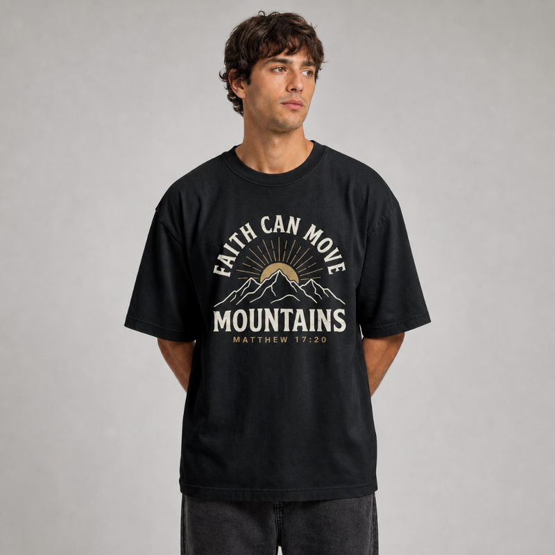 Man wearing the Faith Can Move Mountains T-shirt