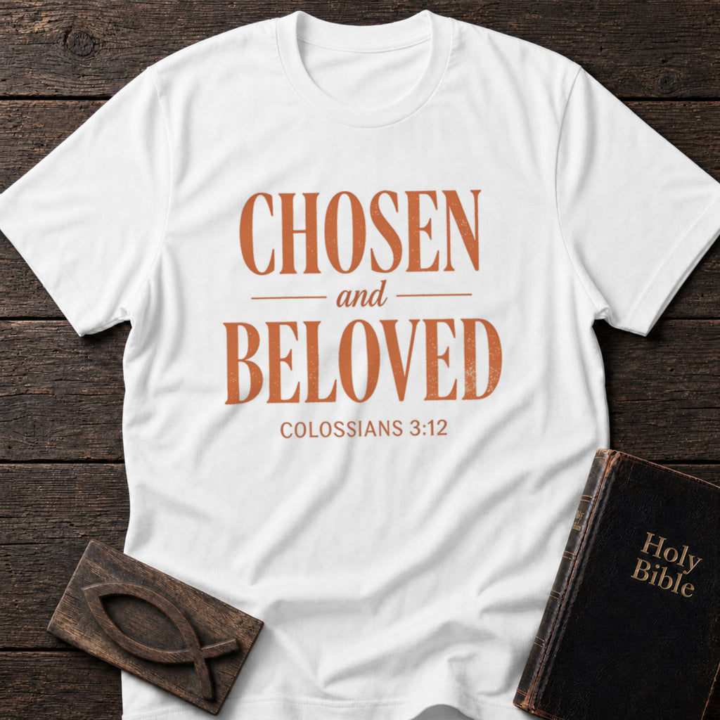 Chosen and Beloved t-shirt in White — Colossians 3:12 Christian tee flat lay with Holy Bible and ichthys on dark wood