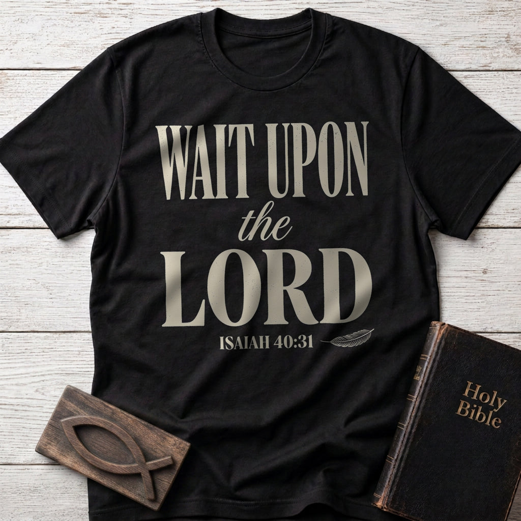 Wait Upon the Lord t-shirt in Black — Isaiah 40:31 Christian tee flat lay with Holy Bible and ichthys on whitewashed wood