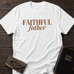 Faithful Father t-shirt in White — Christian tee flat lay with Holy Bible and ichthys on dark wood