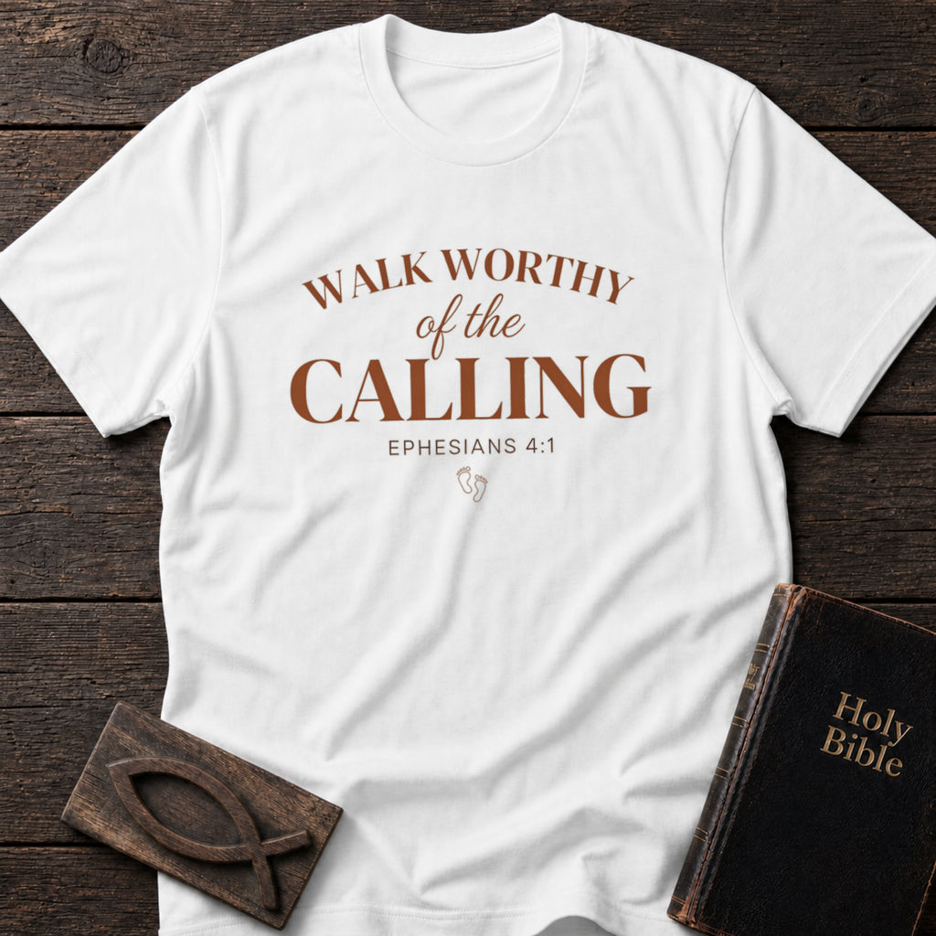 Walk Worthy of the Calling t-shirt in White — Ephesians 4:1 Christian tee flat lay with Holy Bible and ichthys on dark wood